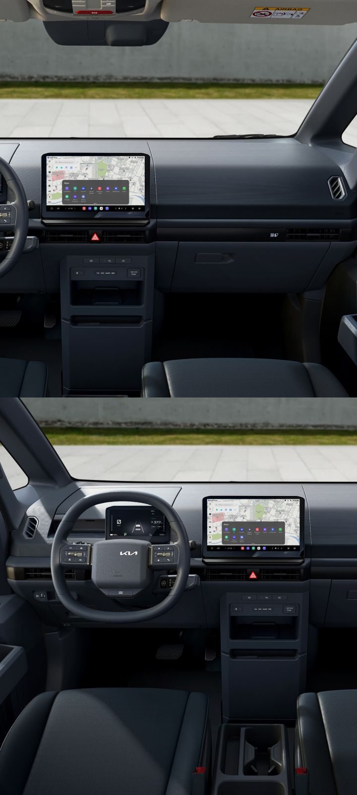 Fahrerperspektive auf das Cockpit des Kia PV5 Cargo mit Lenkrad und Infotainment-Display.
